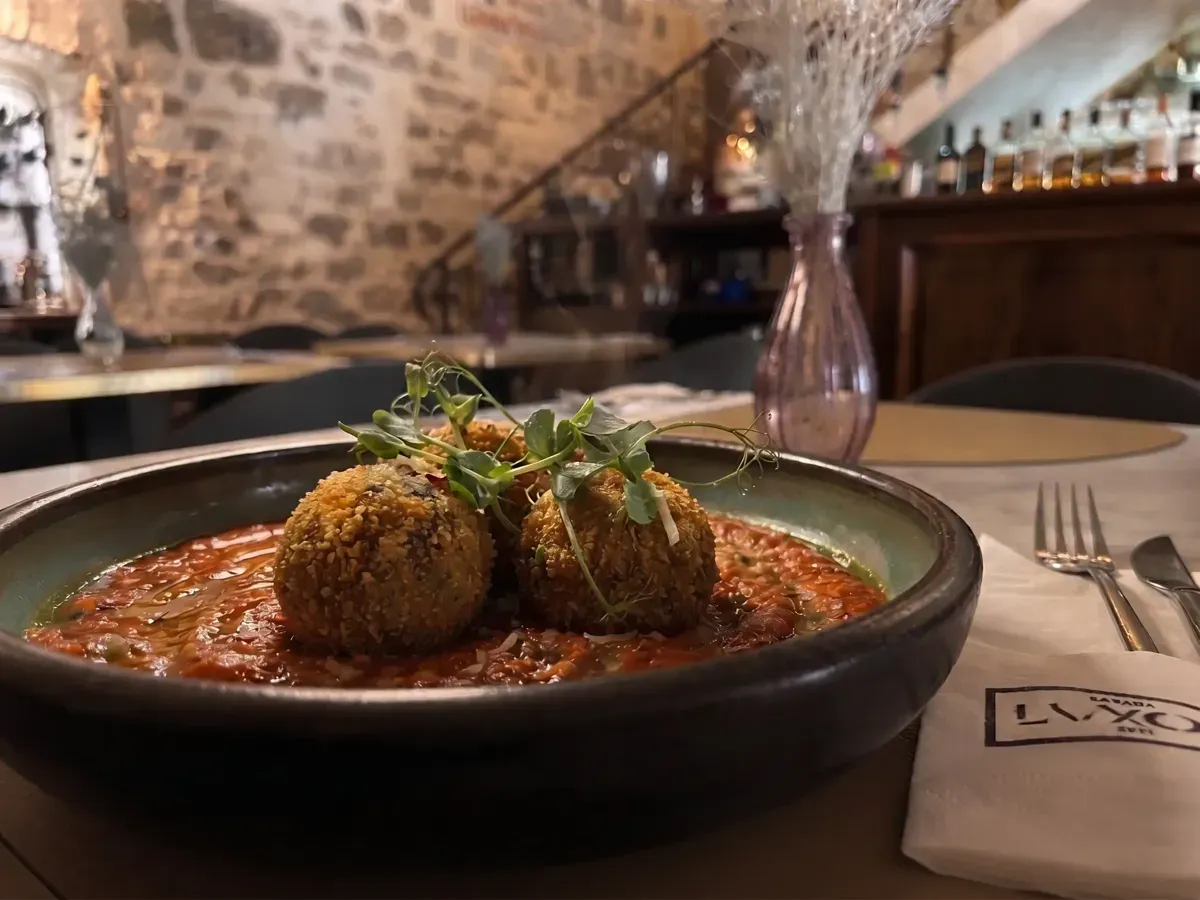 Crispy Arancini with Black Risotto on Peristil Square, Café & Restaurant Lvxor Split