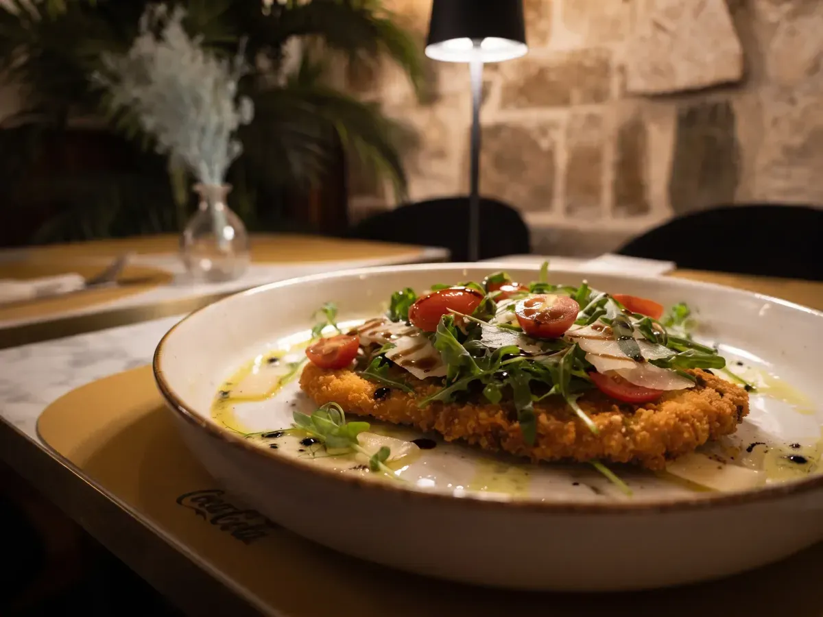 Crispy Chicken Milanese on Peristil Square, Café & Restaurant Lvxor Split