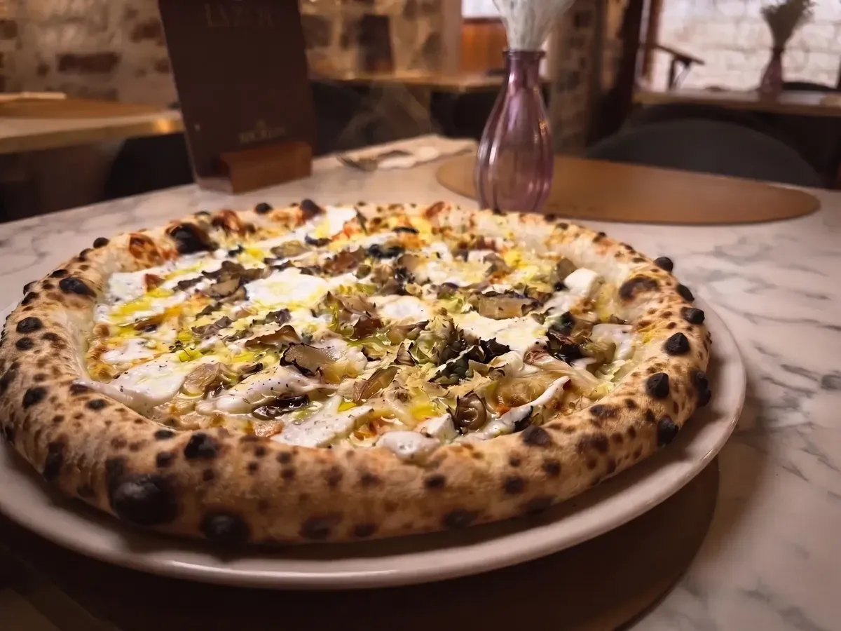 Exquisite Fungi Truffle Pizza on Peristil Square, Café & Restaurant Lvxor Split